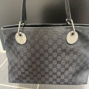 Authentic Gucci handbag with GG canvas material